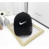 Gorras para hombre y para mujer NIKE flecha grande, color negro-blanco  GOR00015B